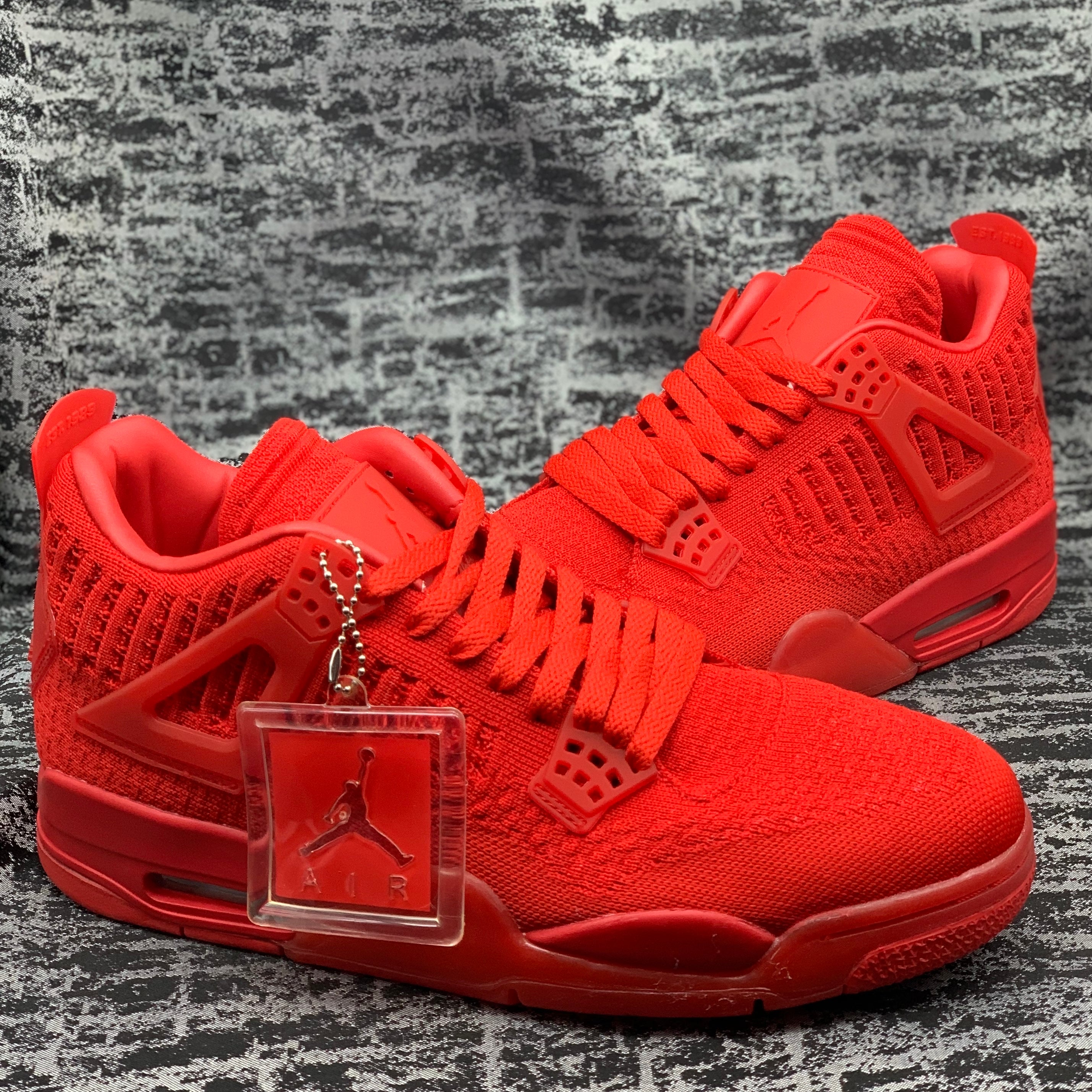 Jordan retro 4 rojos on sale