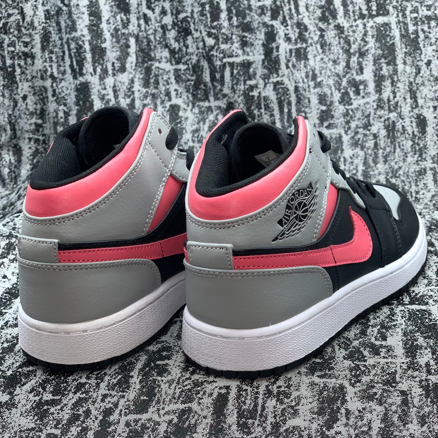 Jordan 1 Mid Gris/Rosa